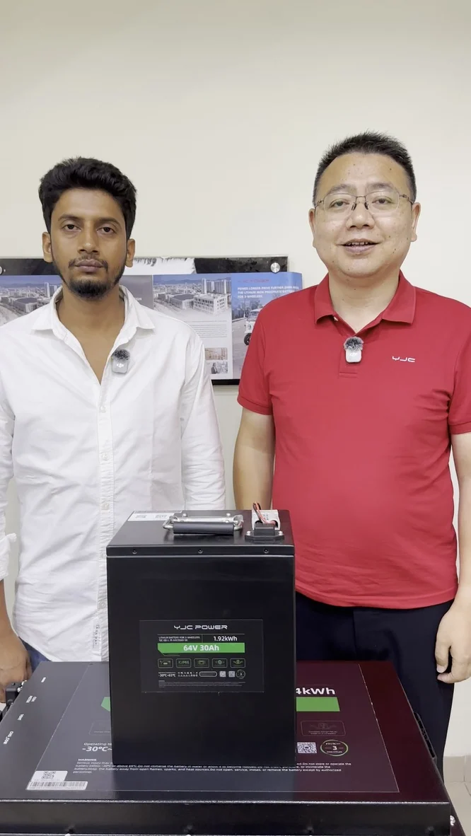 Dowson Nieh with a YJC Power dealer in Bangladesh